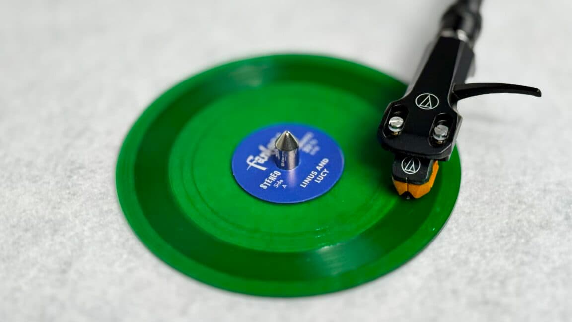 "New Tiny Vinyl: For when your Spotify playlist isn't hip enough. 🎶💀 #RecordPlayerButMakeItPocket"