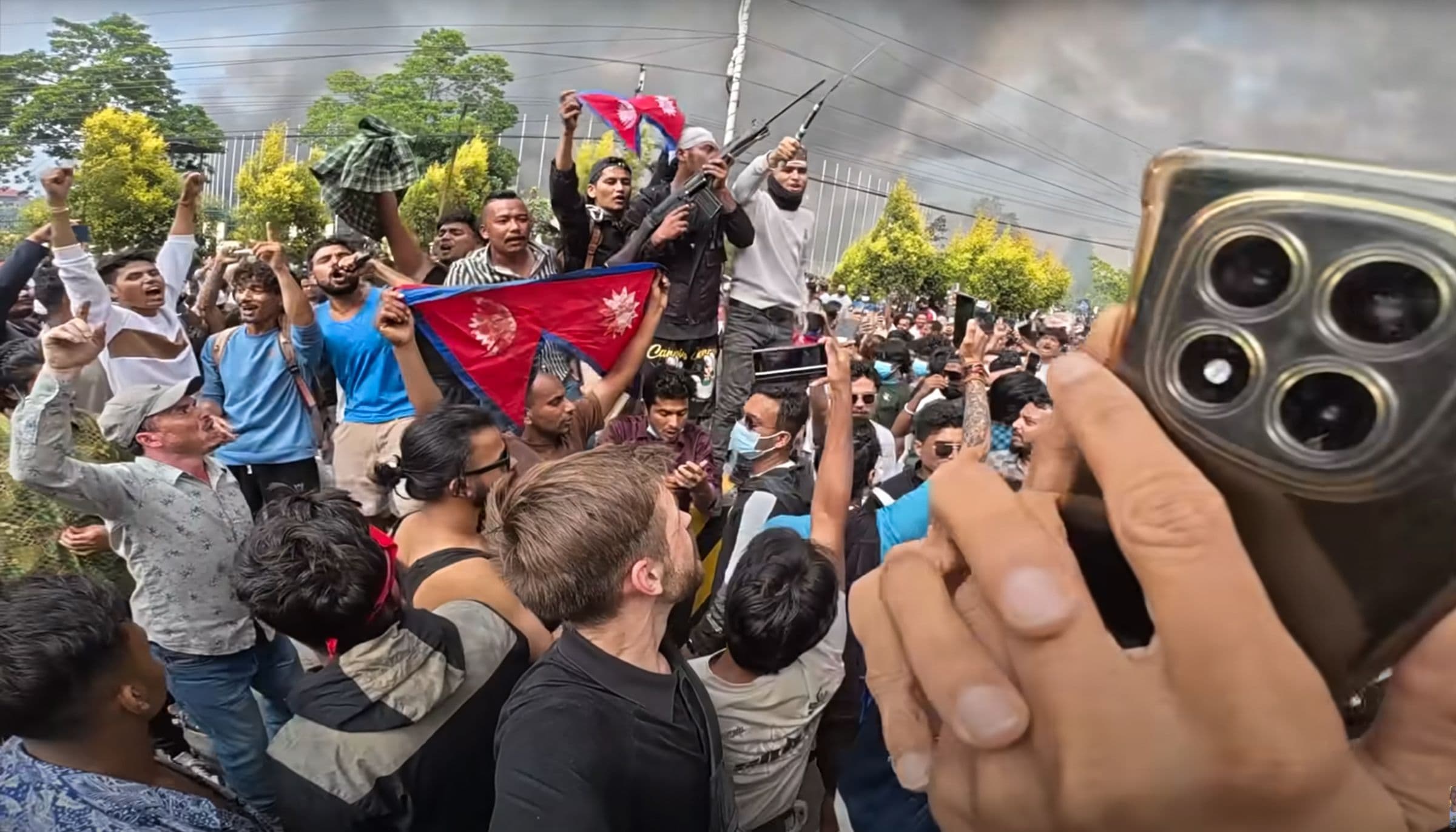 "When your travel vlog becomes a front-row seat to a revolution in Nepal 🇳🇵🔥 #ContentKing"