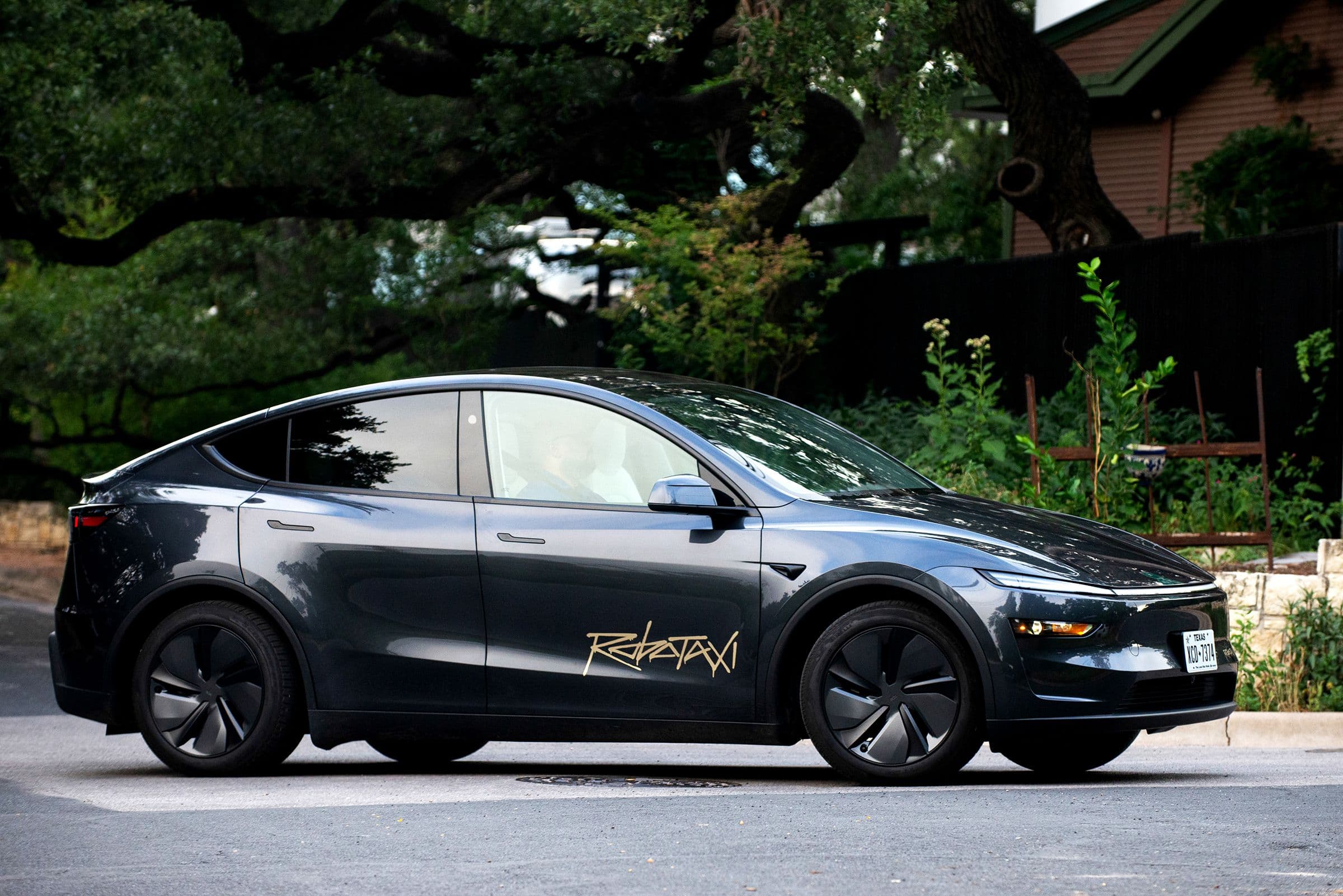 "Tesla's about to drop a taxi service in SF, but no robot cars 🤖❌ Just regular ol’ chaos! 🚖💀 #RoboDrama"